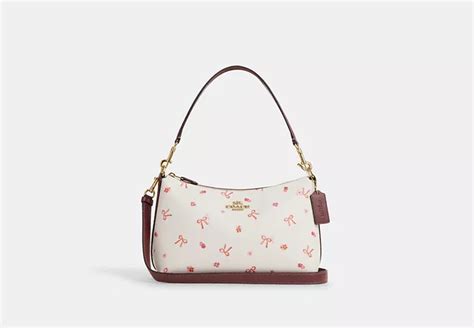 coach outlet bow print